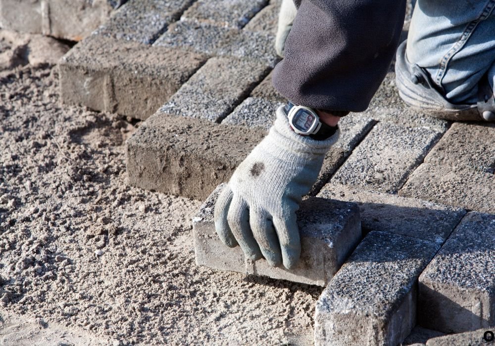 Why Power Washing and Re-Sanding Pavers Matters